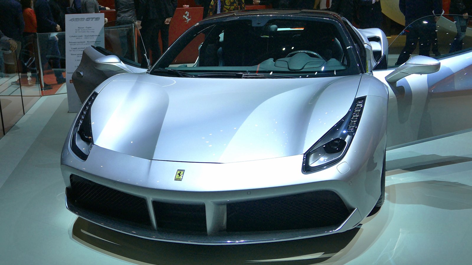 A silver Ferrari luxury sports car, representative image