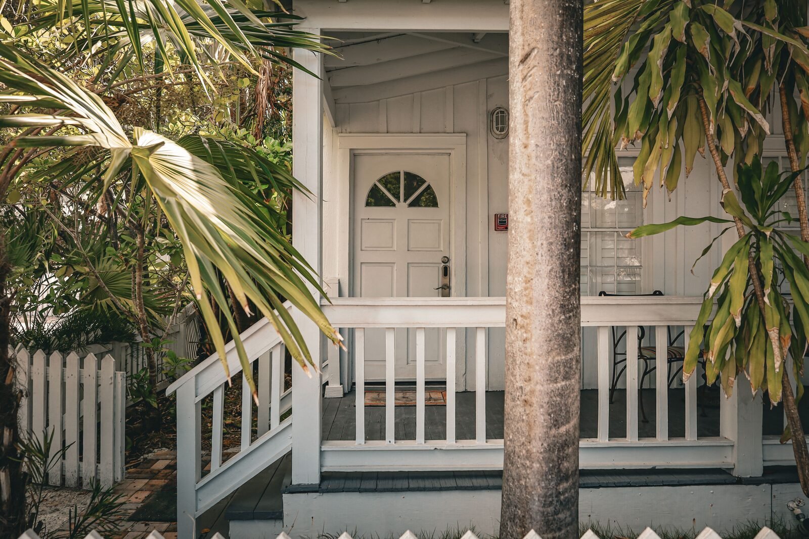 Illustrative house exterior with palm trees, not Mikey Madison's actual residence